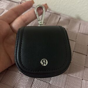 Lululemon Detachable, clippable pouch keeps your earbuds, coins, and keys close